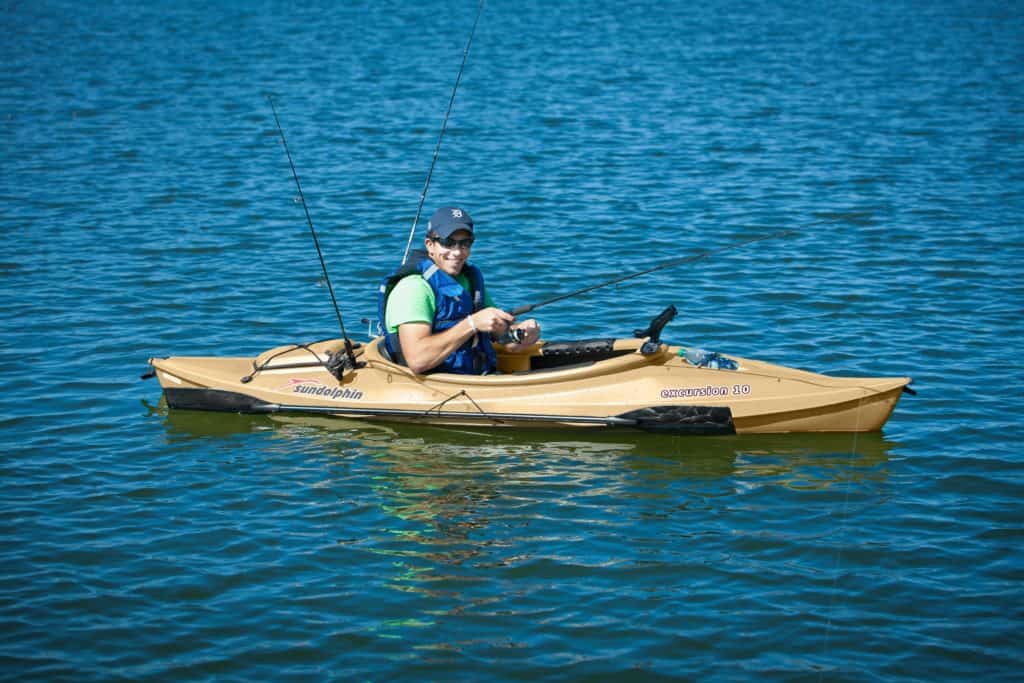 guy paddling a sun dolphin