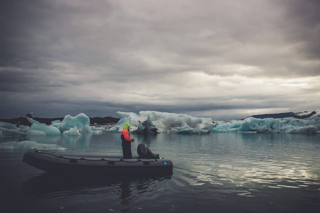 guy fishing on best inflatable boat